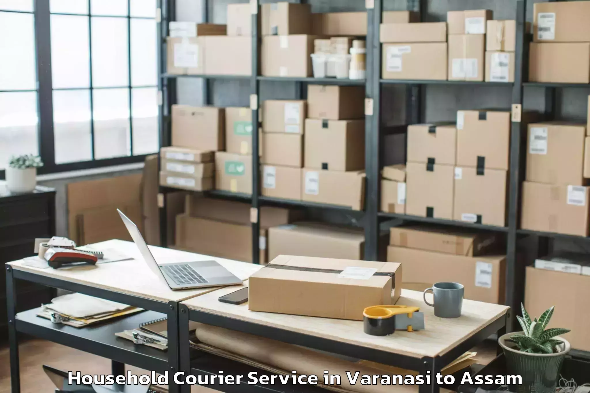 Easy Varanasi to Khoirabari Pt Household Courier Booking